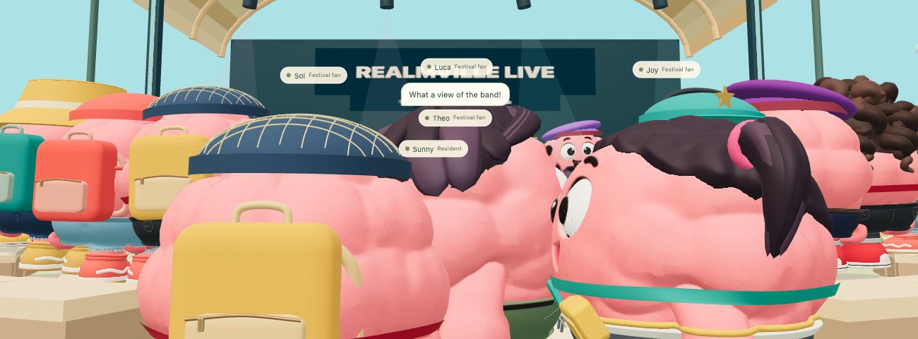 Colorful Brainyville characters gathered at an outdoor concert stage.